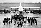 A complete Valiant team of aircrew, ground engineers and ground support equipment mustered before a Valiant of Bomber Command.